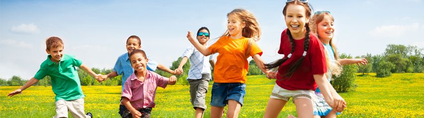 Children playing in field - page header