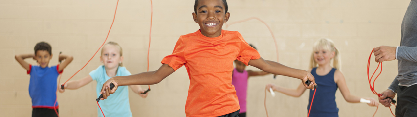 Children playing skipping rope - page header